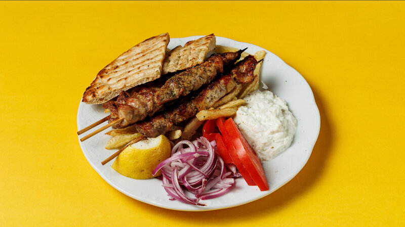 GRILLED PORK SOUVLAKI (3pcs),tomato,onion,tzatziki,pita bread ,french fries